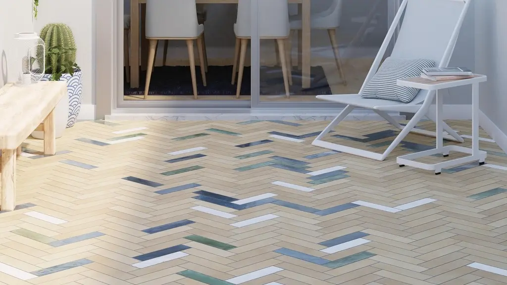 Outdoor patio with light herringbone tile flooring