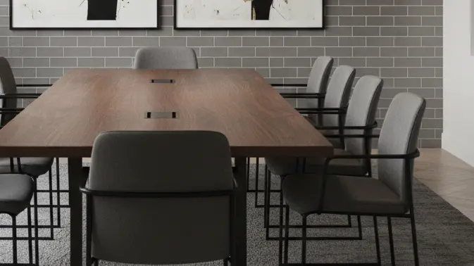 Gray subway tile wall in a modern meeting room