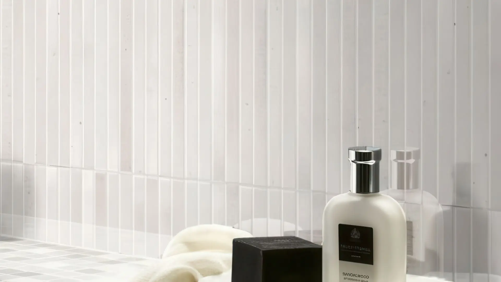 White vertical tile wall with clean grout lines in a modern bathroom