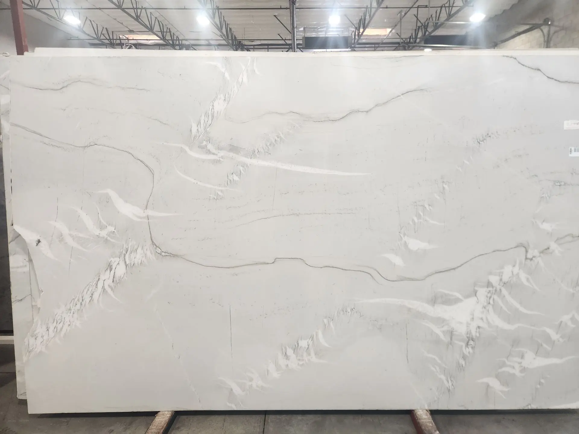 Zermatt quartzite slab with soft gray veining, available at Nova Tile and Stone in Minden, NV