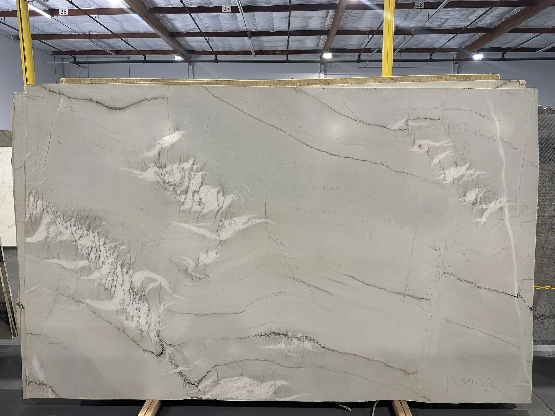 Zermatt quartzite slab with layered gray veining, available at Nova Tile and Stone in Sacramento, CA
