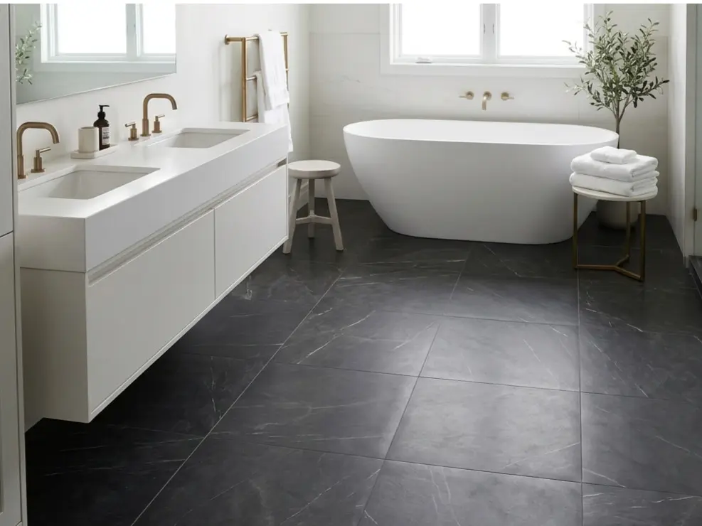 Graphite Marble Flooring honed finish in luxury bathroom floor with contrasting light fixtures