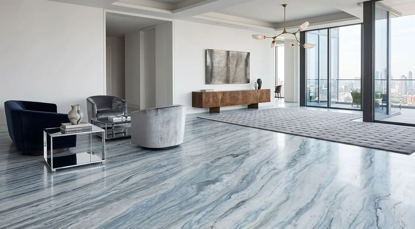 Luxury apartment with large glass doors, and a floor of Sky Blue quartzite