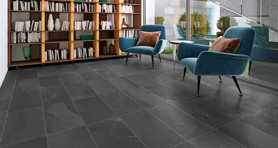Slate look subway tile flooring with dark gray rectangular tiles laid in a horizontal pattern.