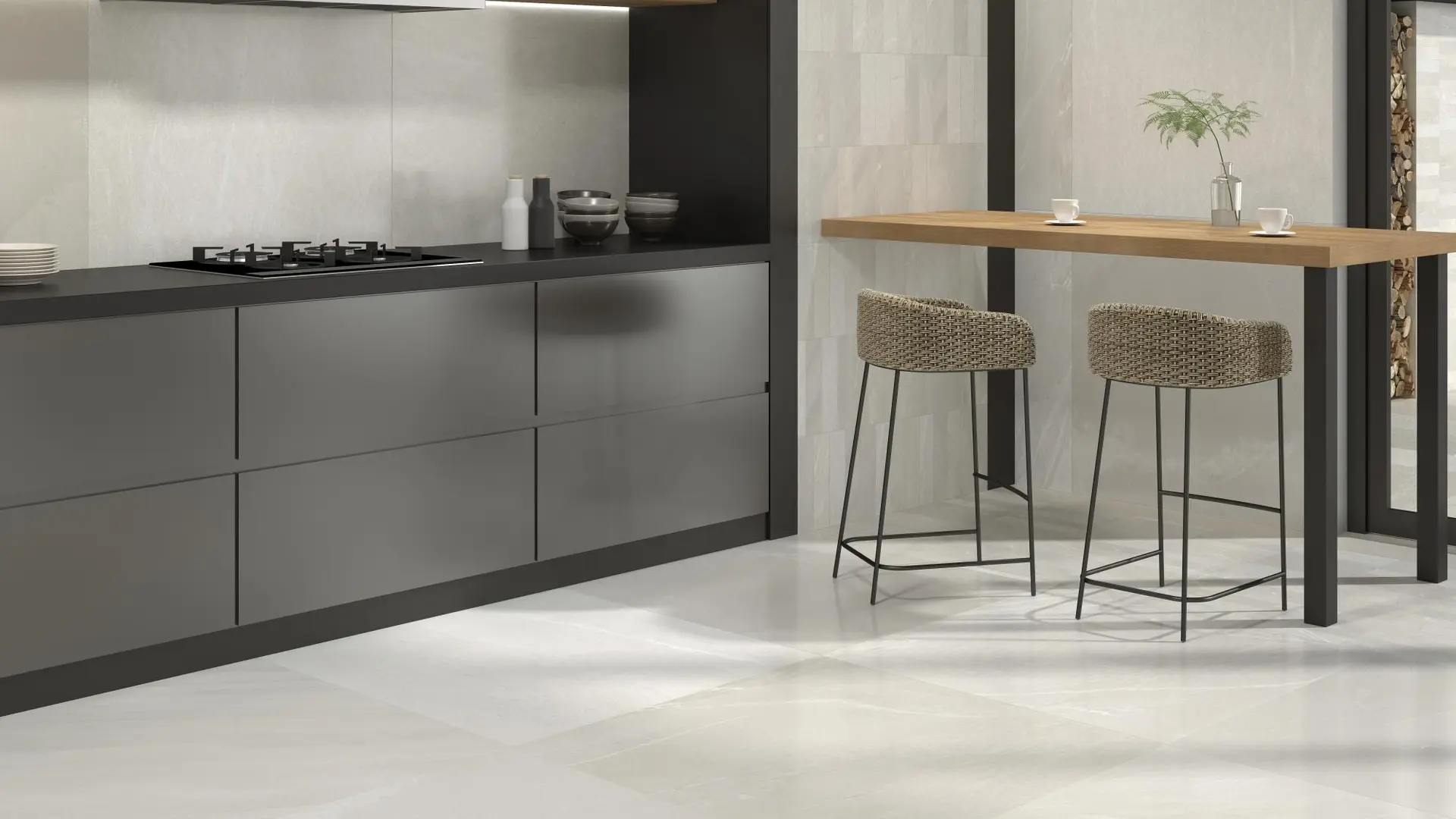 Modern kitchen with dark gray and wood cabinets, light floors, and a backsplash made from Cardaso Stone Look Porcelain Subway Tile