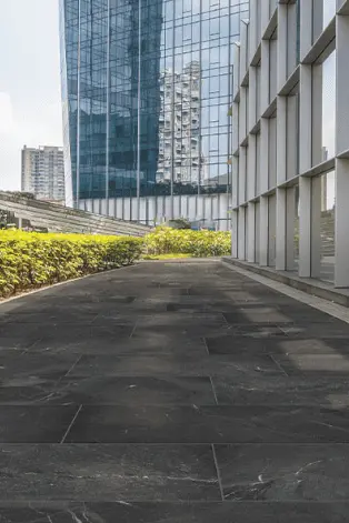Contemporary slate-look porcelain tile on outdoor patio deck