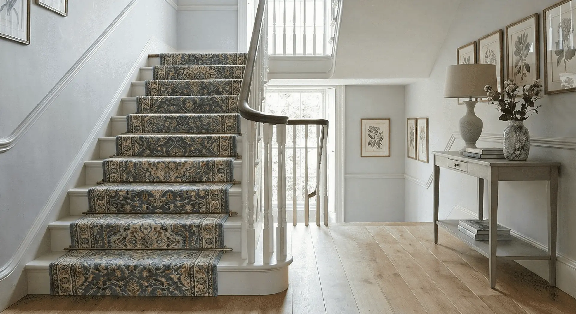 Staircase with patterned carpet runner at Nova Tile and Stone showroom