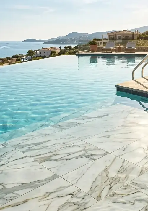 Conceptual rendering of marble-veined porcelain pool tile on a pool floor