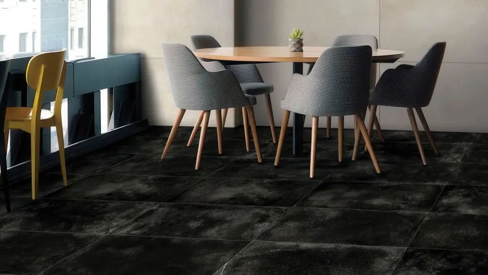 Conceptual rendering of a modern cafe with Gotham charcoal 24x24 cement look porcelain tile flooring