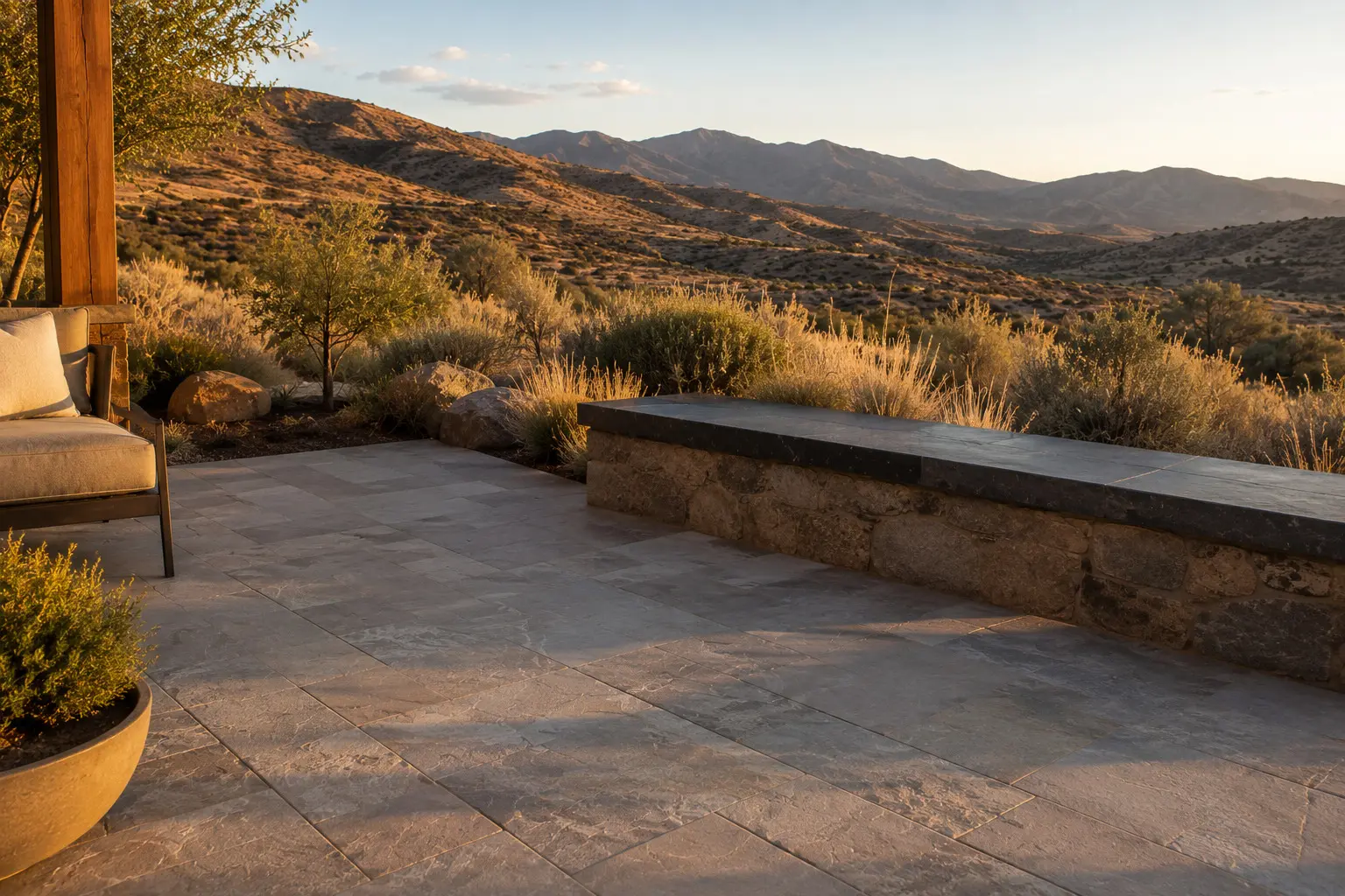 Conceptual rendering of a Honed quartzite patio pavers with a leathered granite seat wall in a high-desert backyard