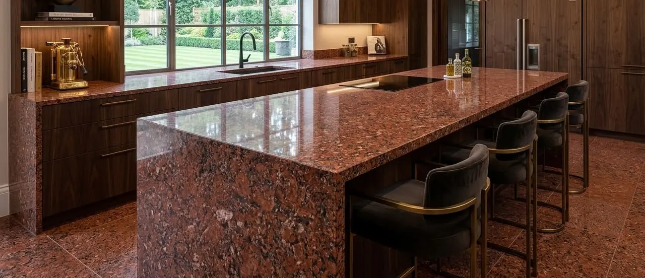 Conceptual rendering of modern kitchen in Stateline, NV with island and countertops made of Imperial red granite