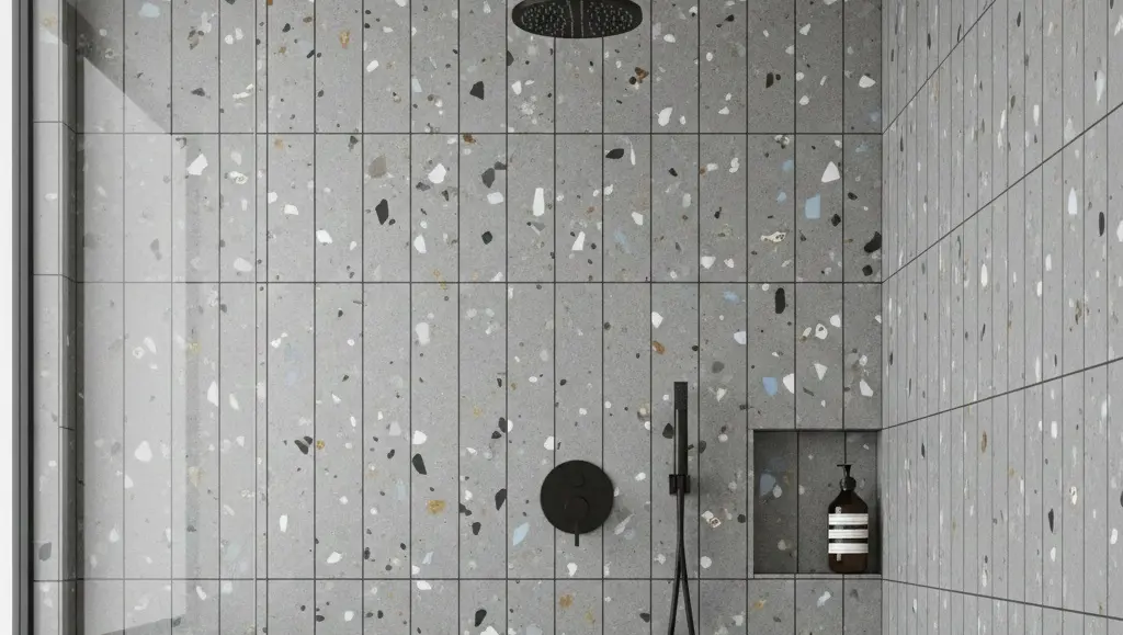 Conceptual rendering of terrazzo-look tile shower wall with black rain showerhead and fixtures
