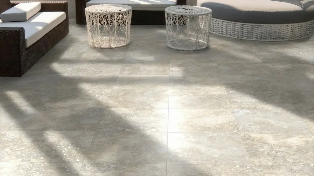 Travertine-look porcelain tile on outdoor patio