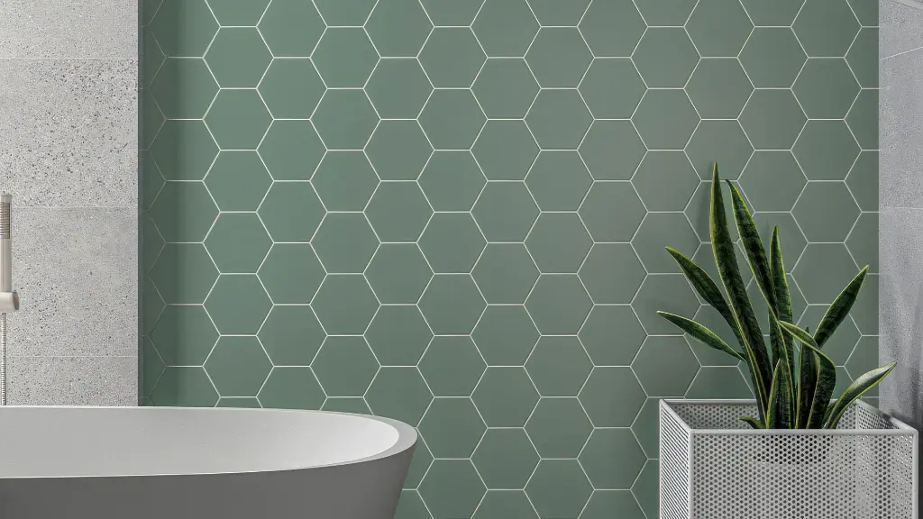 6x7 matte hexagon porcelain tile installed on a bathroom wall beside a freestanding bathtub