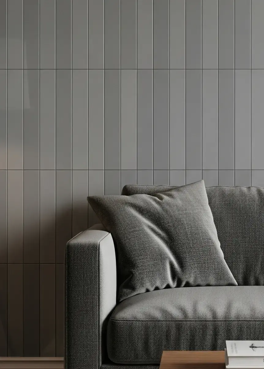 Grey subway tile in a running bond pattern on an interior wall