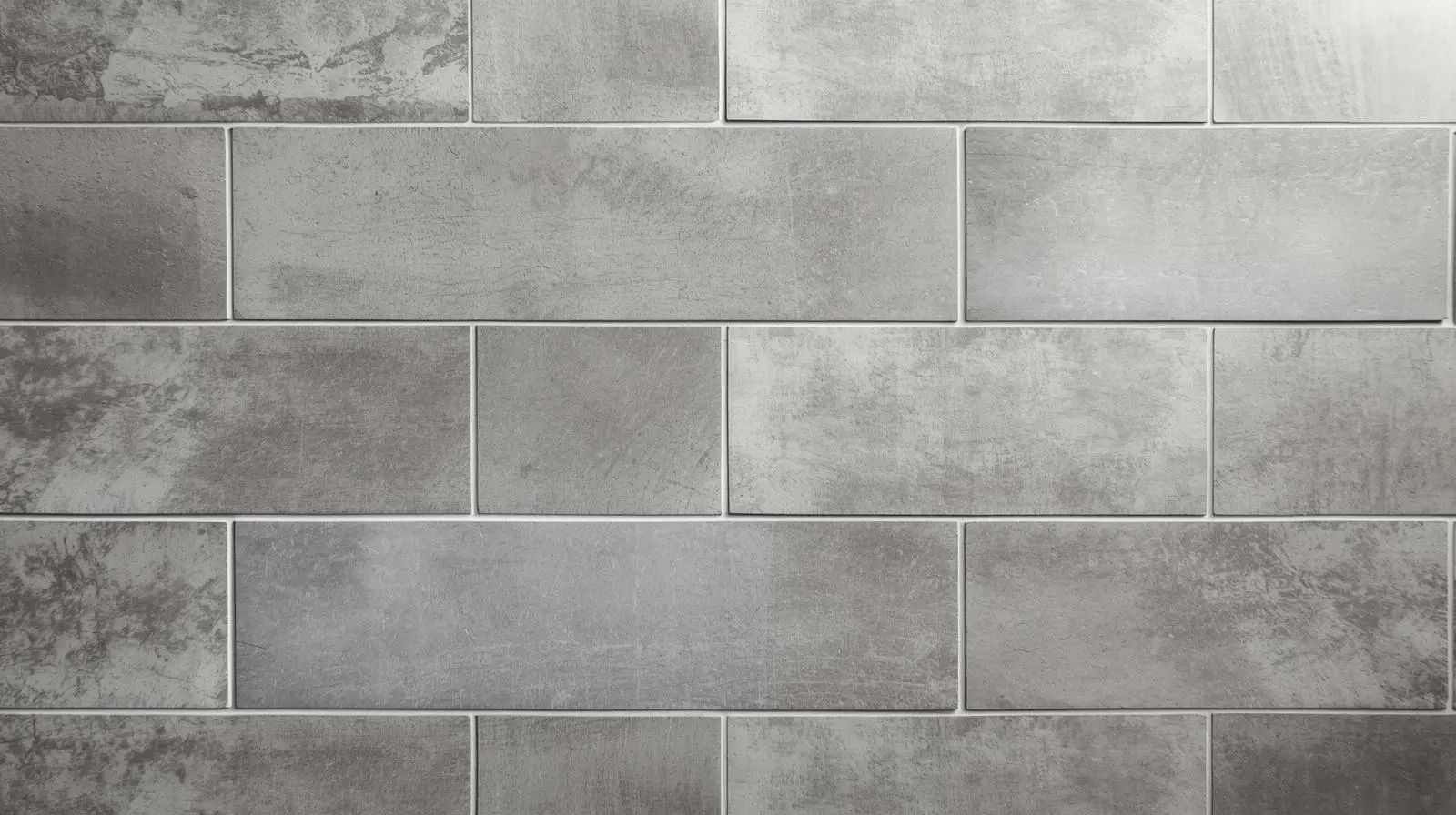 Gray concrete look subway tile in a matte finish