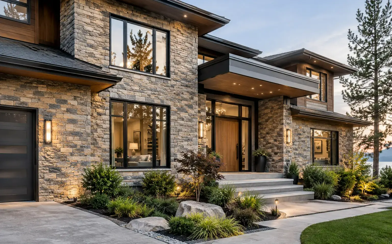 Conceptual rendering of a modern home entrance with stacked stone facade at dusk.