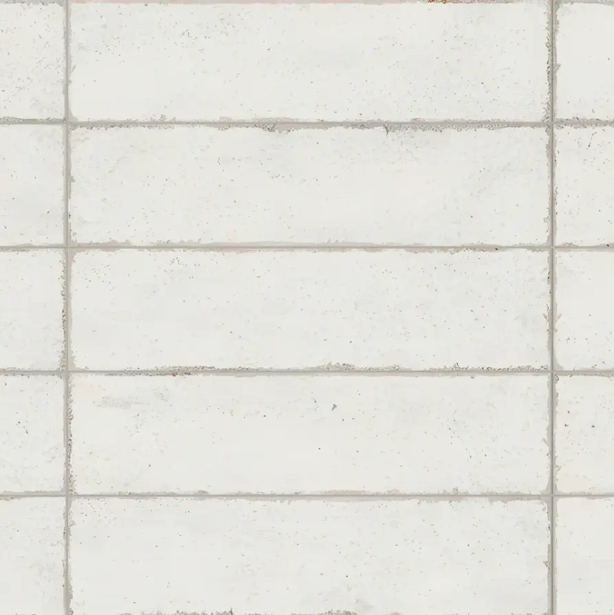 Nantes 3x12 matte ceramic subway tile installed in a horizontal brick pattern.