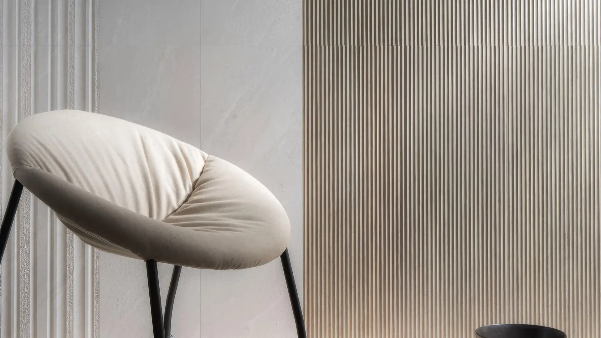 Aura taupe matte 3D wood look wall tile in a room setting.