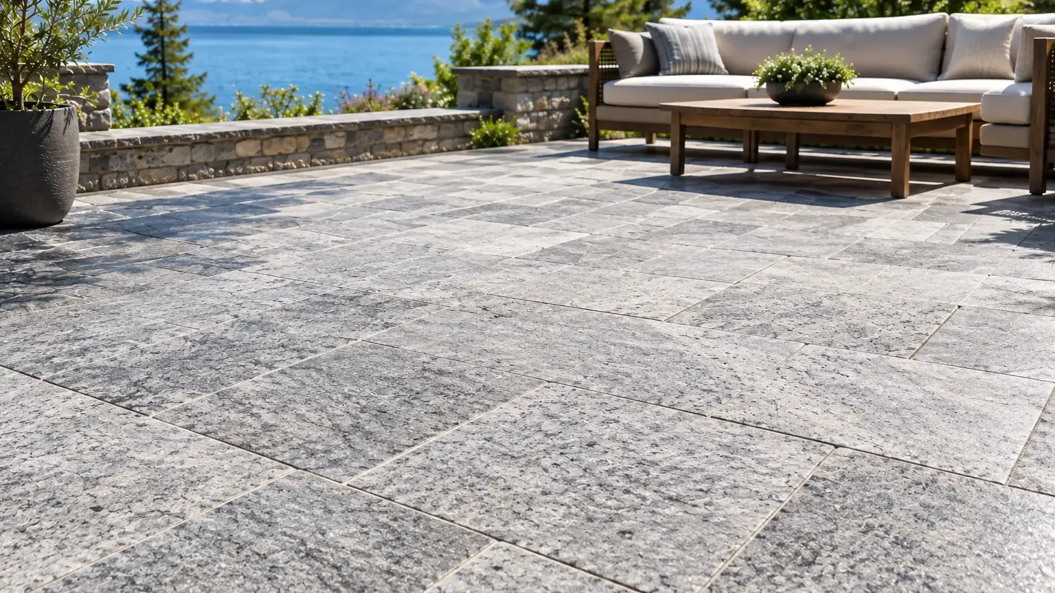 Conceptual rendering of granite pavers in direct sunlight on an outdoor patio.