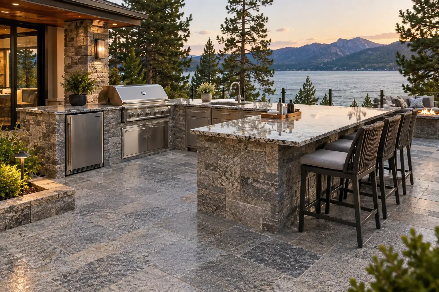 Conceptual rendering of an outdoor kitchen with a granite countertop, stacked stone island, and gray stone pavers.